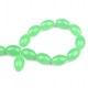 Oval glass beads 15x10mm Light green